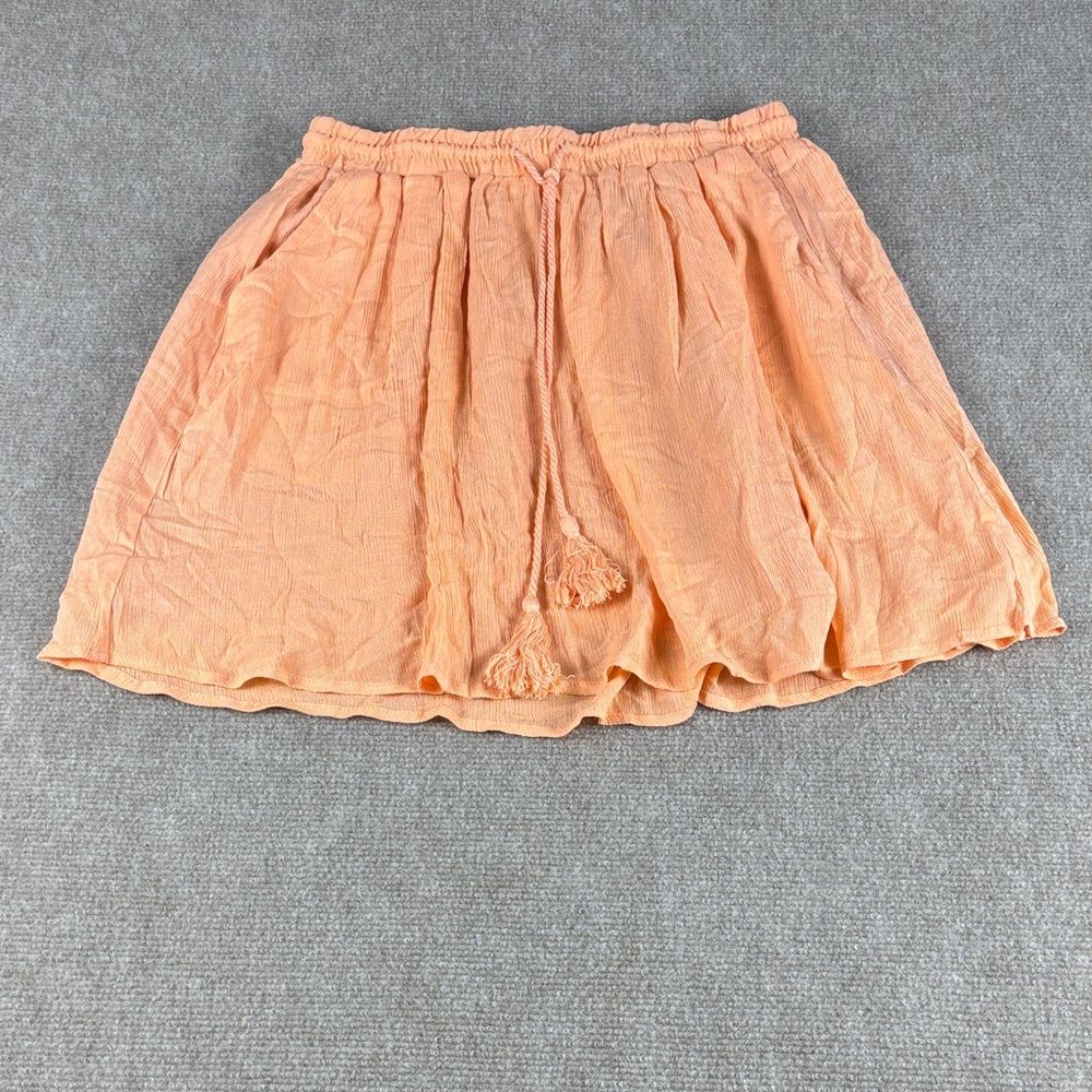 NeedleWorks Peach Pull On Tasseled Mini Lined Front Pockets Skirt Size M NWT